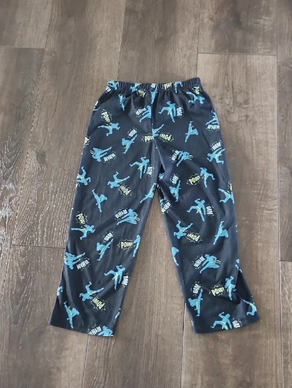 Carter's Black Pajama Bottoms with Blue and Yellow Action Motifs